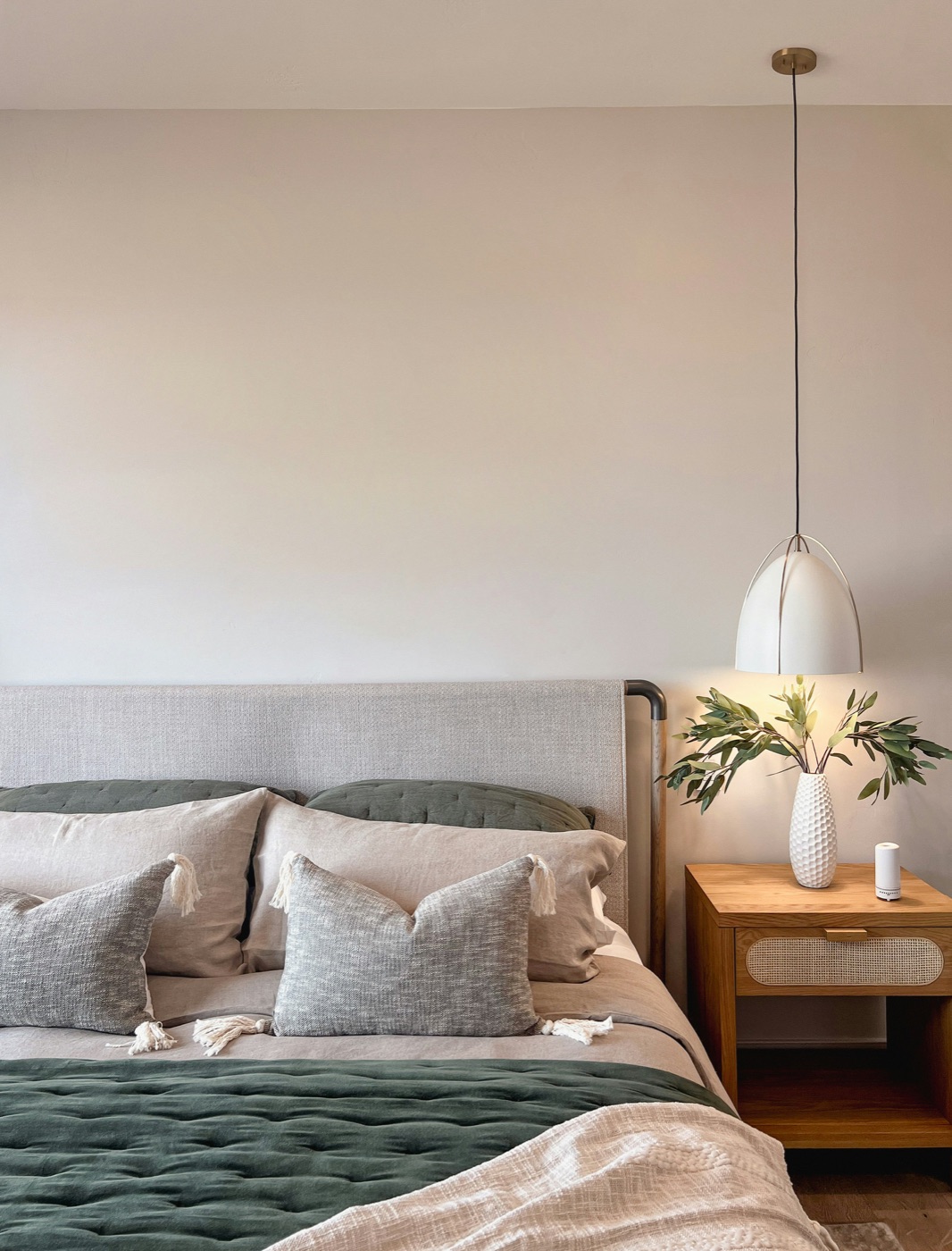 Light-filled bedroom with soft linens